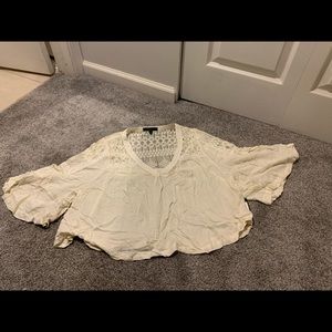 Cream size small lace float top